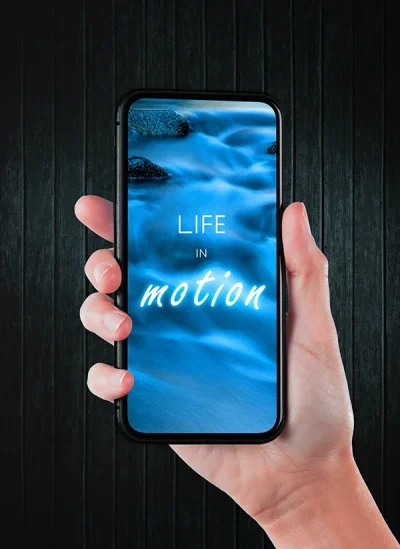 hand mit smartphone, zeigt das smartphone-wallpaper life in motion