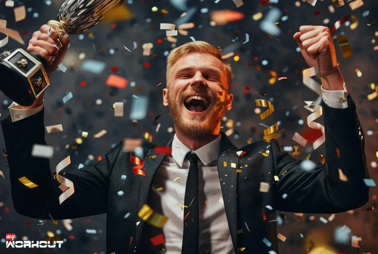 Was ist Erfolg wirklich und wie werde ich erfolgreich? Die Antwort beginnt mit deinem «Warum» Ein Mann feiert seinen Erfolg